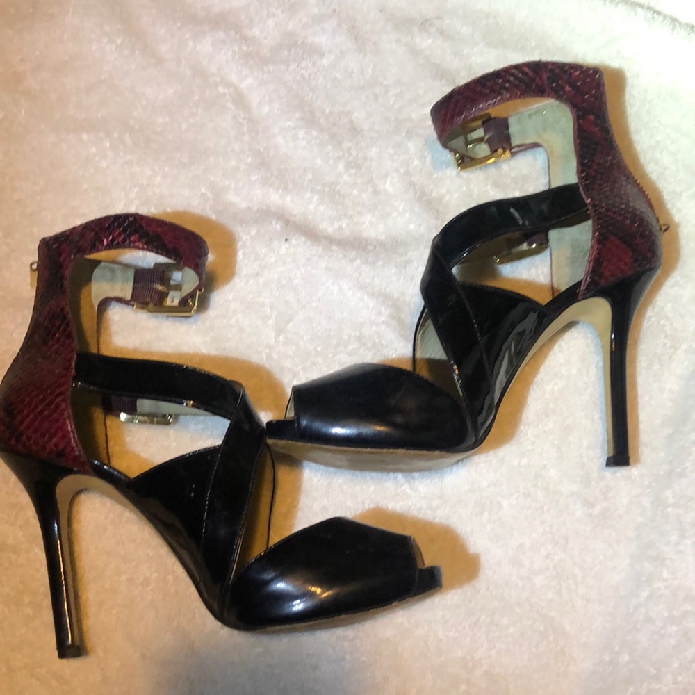 Women’s Michael Kors 7 1/2 red snake skin and black heels